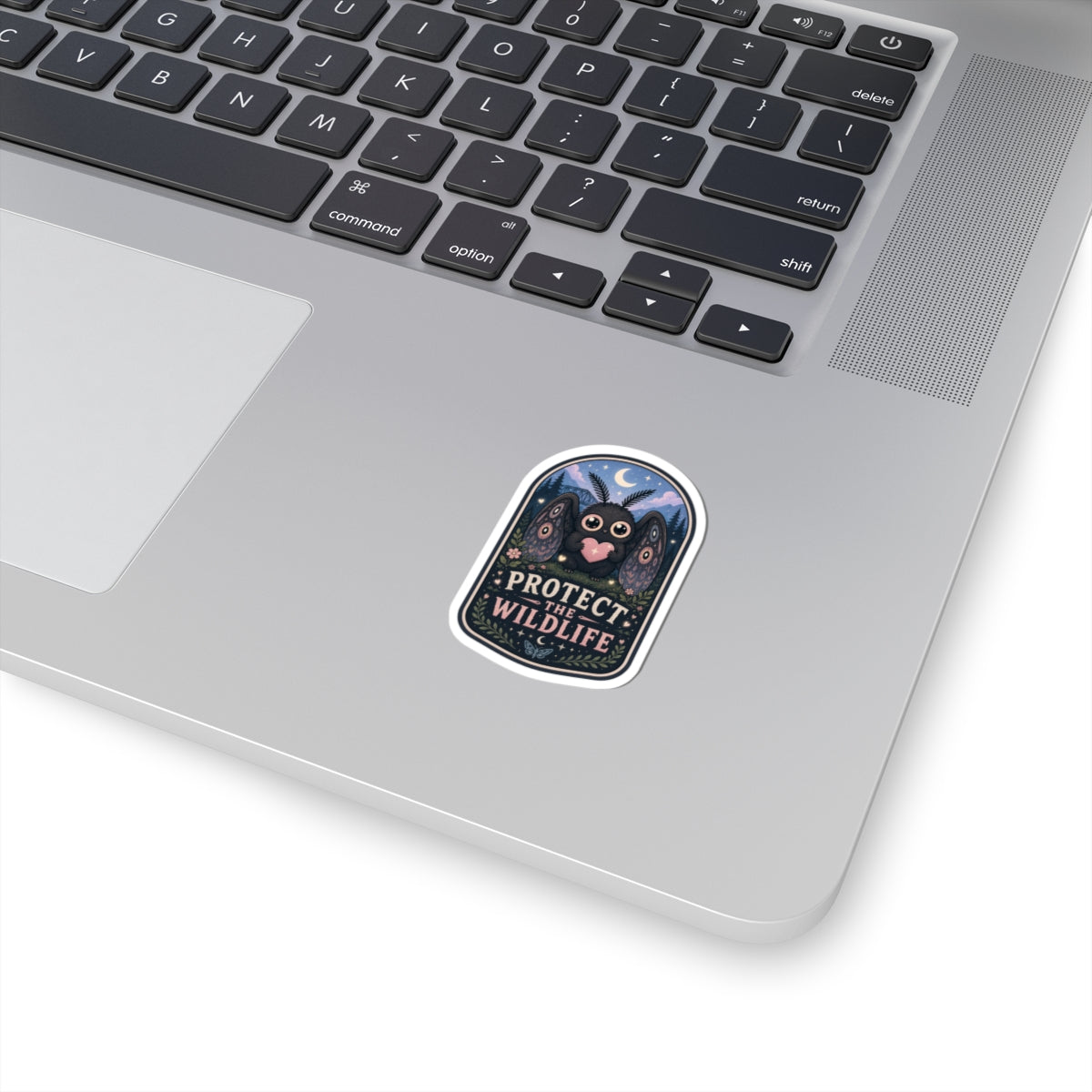 Protect the Wildlife sticker | Cute Mothman holding heart, night forest scene